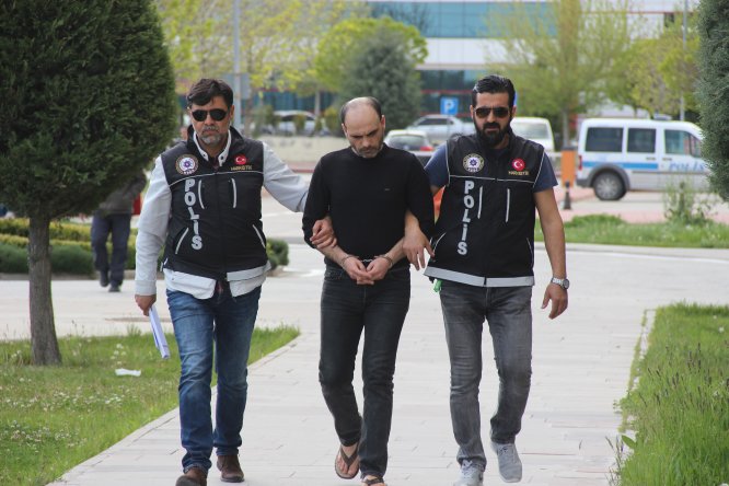 Uyuşturucuyu 11 yaşındaki oğlunun üzerine sarmış