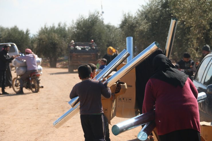 TDV'den Suriyeli ailelere soba ve yakacak yardımı