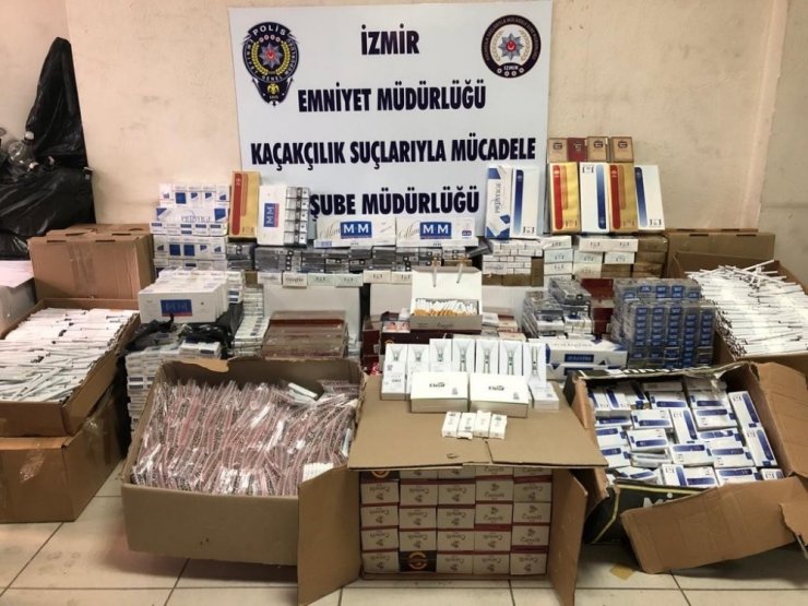 İzmir’de 7 bin 200 paket kaçak sigara ve 185 şişe sahte içki ele geçirildi